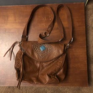 Damon’s handbag/ purse. It is in good shape